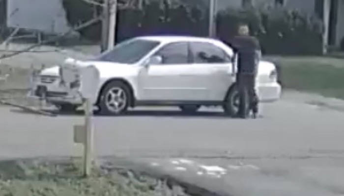 Man with white Honda
