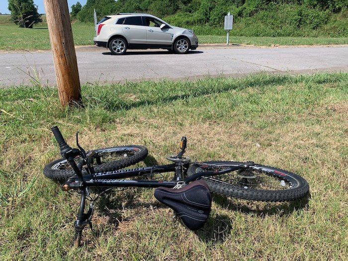 SUV hits bicyclist on West College St.