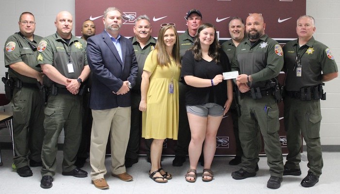 Madysson Tibbs receives scholarship from SRO Division