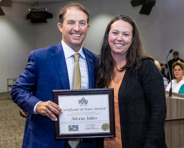 Mayor Shane McFarland recognizes Alexia Jakes with STARS Award