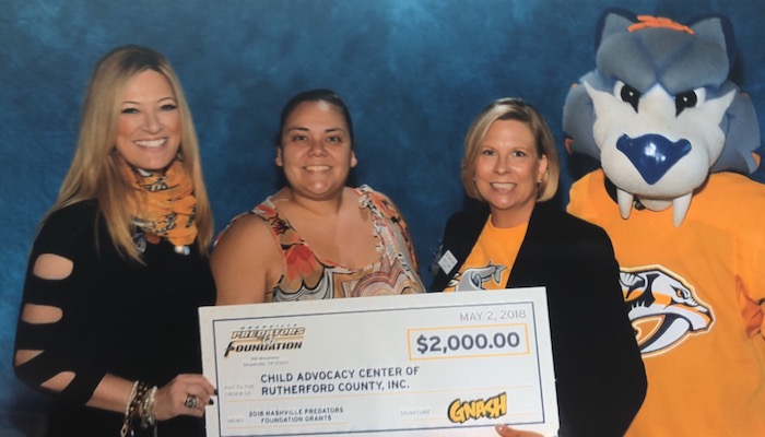 Predators check to Child Advocacy Center