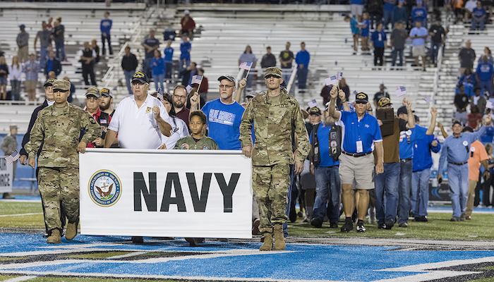 Navy veterans cross the MTSU field