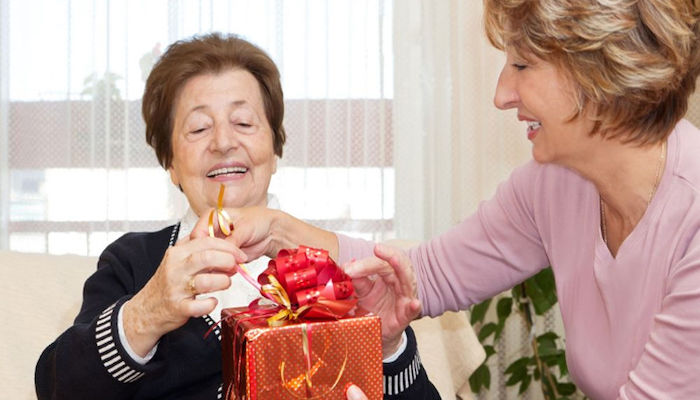 Senior citizens getting Christmas presents