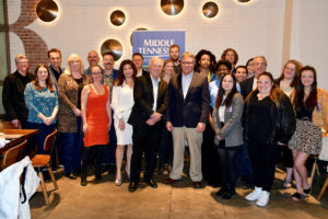Ken Paulson, center left, dean of MTSU’s College of Media and Entertainment, and Provost Mark Byrnes, center right, pose with some of the attendees of Friday night’s MTSU Alumni Association reception for Southern California graduates. (MTSU Photo by Andrew Oppmann)