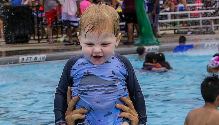 Kid in SportsCom Pool