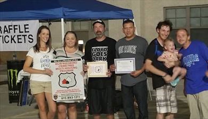 Crime Free Multi-Housing symbol and apartment community team
