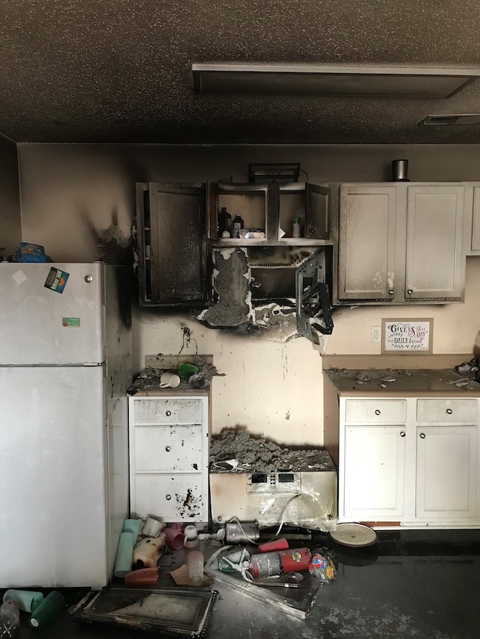 Apartment stove fire at The Blue Apartments
