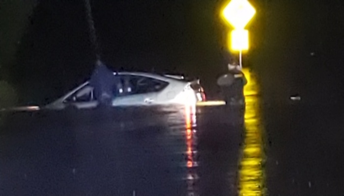 Deputy Nikolas Madore rescues a driver