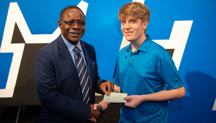 Raider Relief donation check