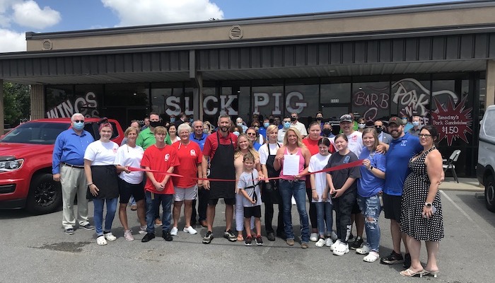 Ribbon Cutting for Slick Pig