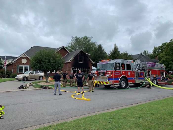 Husband and wife escape house fire