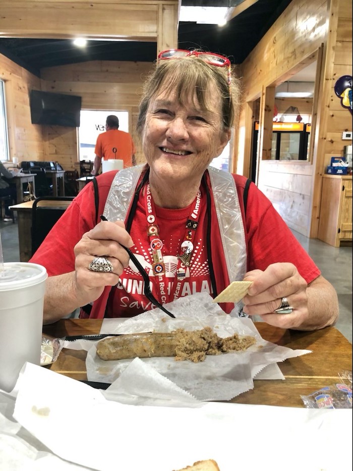 Local Red Cross volunteer assisting with Hurricane Delta recovery