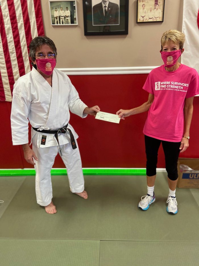 Bill Taylor donates to YMCA ABC Program