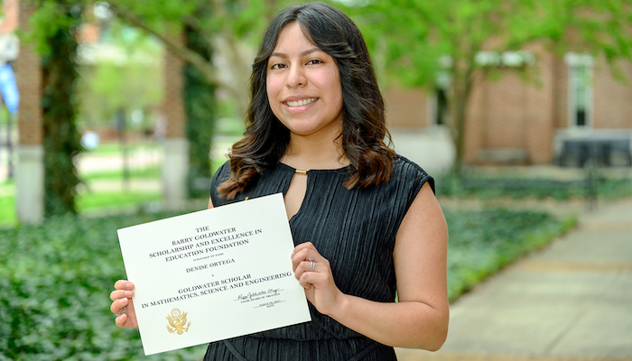 Ortega holds Goldwater certificate