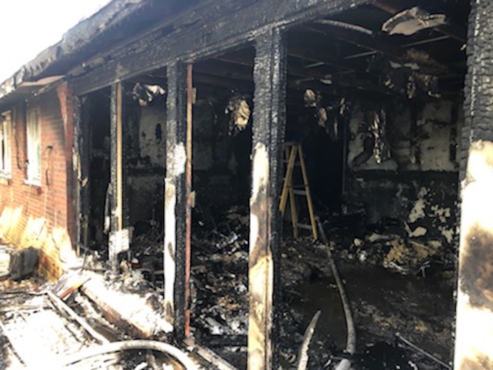 Smyrna Fire Department personnel contain a structure fire
