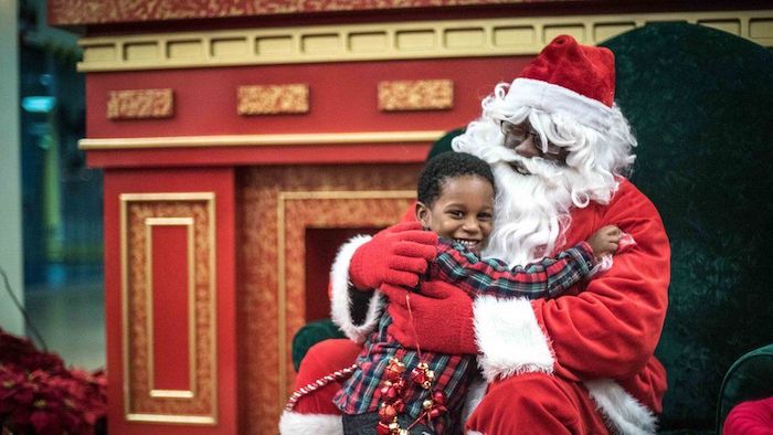 Child on Santa’s Lap and CAC Secret Santa