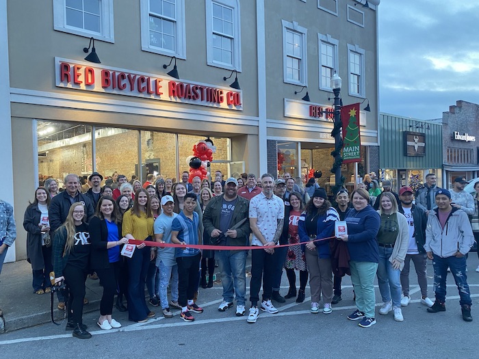 Ribbon Cutting for Red Bicycle - Public Square