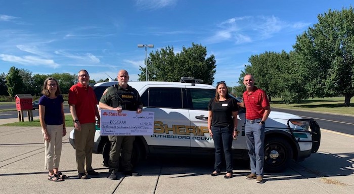 SRO Chad Dodson with State Farm Donation