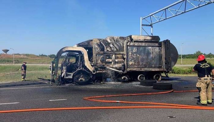 Garbage Truck Catches Fire on Interstate, Driver Not Hurt