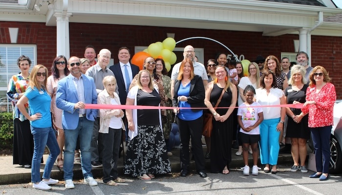 Ribbon Cutting for Travel and Art Club
