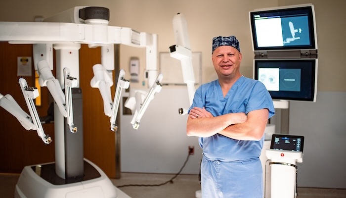 Dr. Otis Rickman stands in front of ION platform at AST West Hospital OR