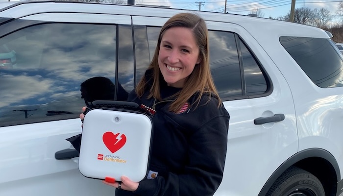 Lora Rodgers with AED