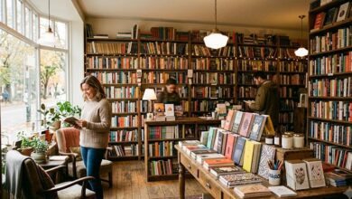 Interior of Bell Bird Books, the independent bookstore on Martin Street in Nashville Wedgewood-Houston, with curated wooden shelves and a stationery display