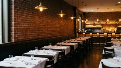 Live-fire grill and plated dishes at a small Nashville restaurant (illustrative)