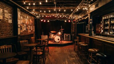 Empty small Nashville basement music club with a corner stage before a free show (illustrative)