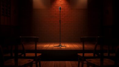 A small warmly lit club stage with a single microphone stand and brick back wall (illustrative)
